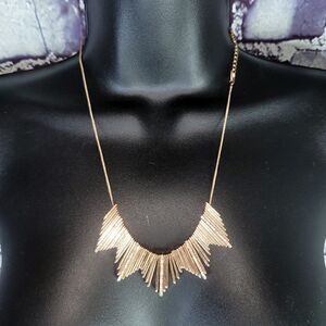 Lydell NYC rose gold tone rhinestone spiky flare necklace w extender